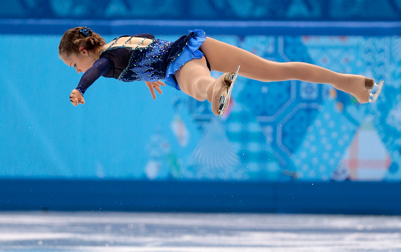 Illustration for article titled Amazing Images of Olympic Figure Skaters Defying Gravity